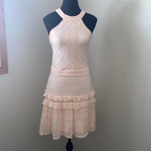 Bebe pink frills dress lace. Large but fits as a Medium.